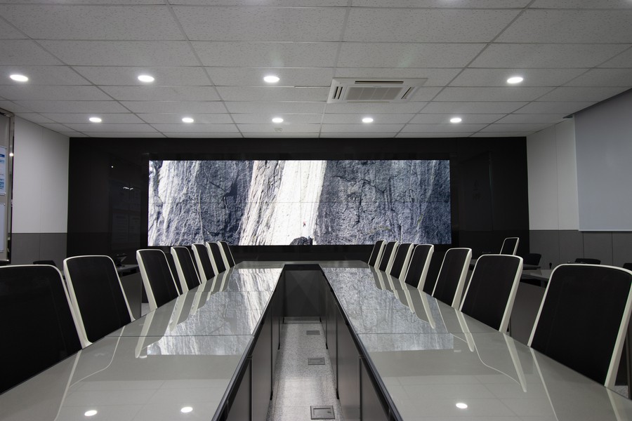 A corporate office’s boardroom with enterprise networking solutions 