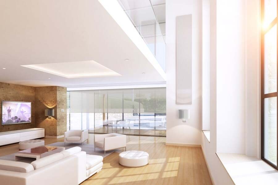 A luxury home with several types of artificial and natural lighting.