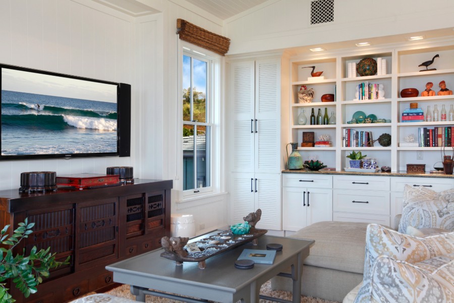 Cozy living room with a couch, coffee table, and TV.