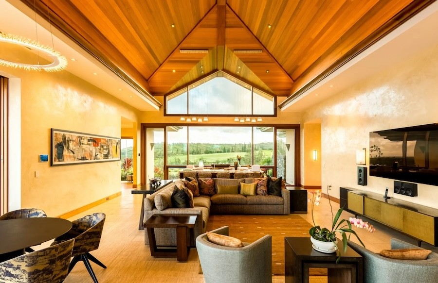 A living room with many lighting layers.